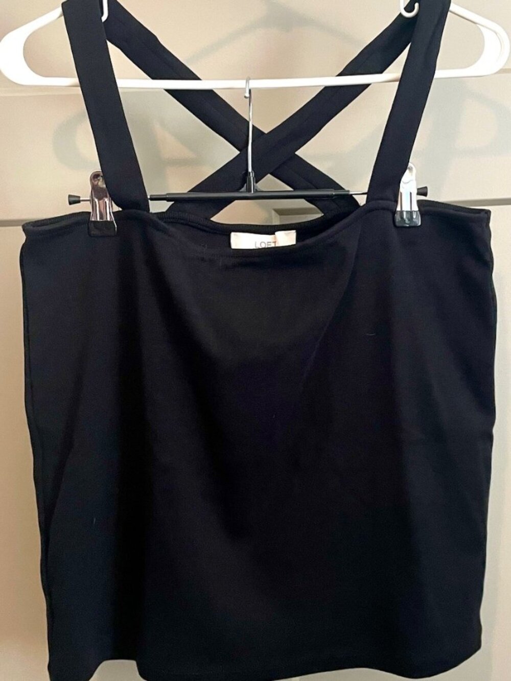 NWT black tank top with straps that cross in the back. XL.